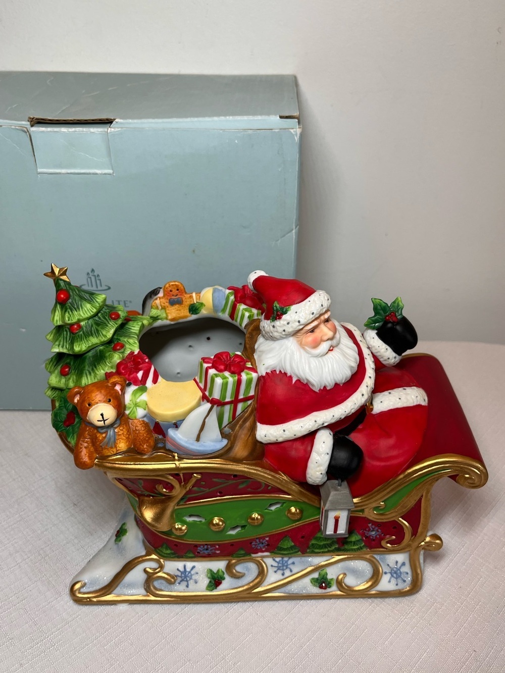 PartyLite Painted Santa in Red Sleigh with Green Tree & Gold Accents